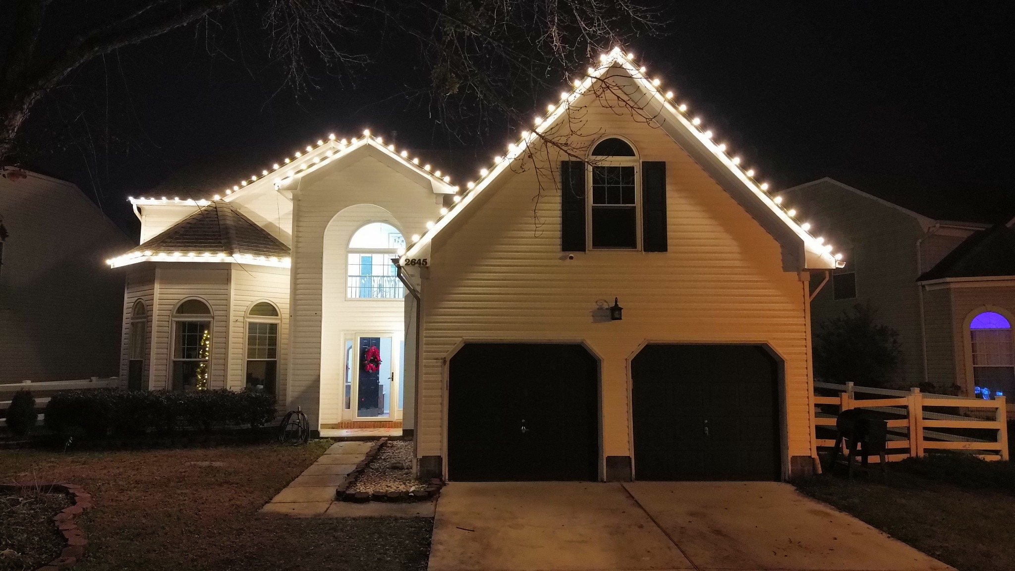 Professional Christmas lights installed on multiple gables